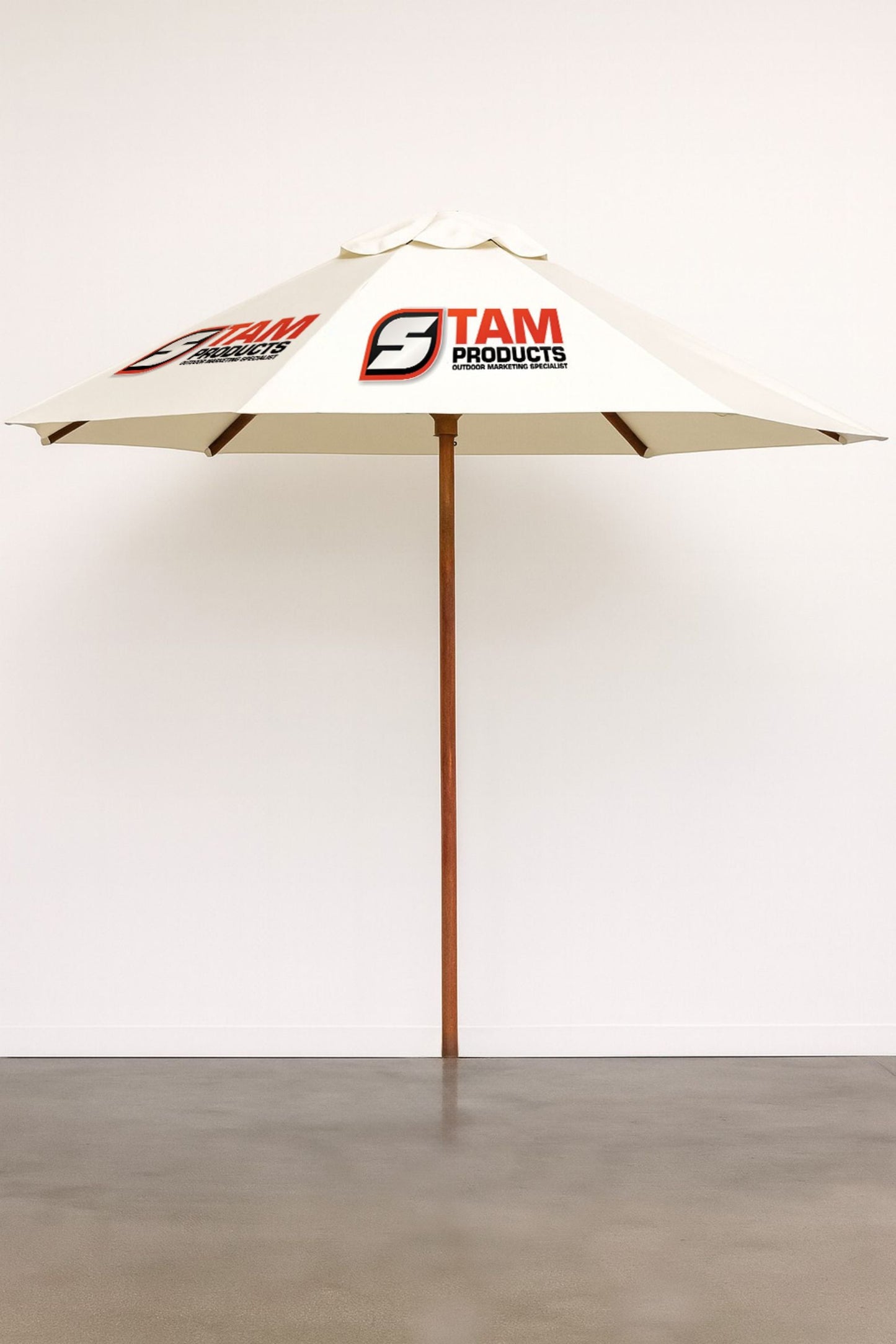 Stam Products custom outdoor branded hexagonal umbrella with wooden frame and white canopy displaying company logo.