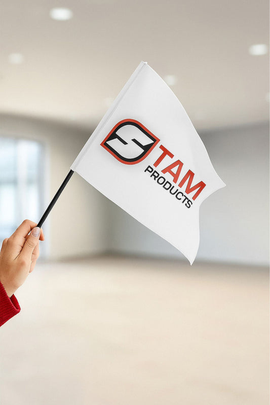Hand holding Stam Products high quality custom branded corporate flag with logo on white polyester fabric