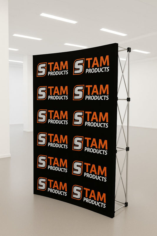 Stam Products Bespoke Printed Branded Curved Wall Banner with black fabric and orange logo on lightweight folding aluminum frame in white room