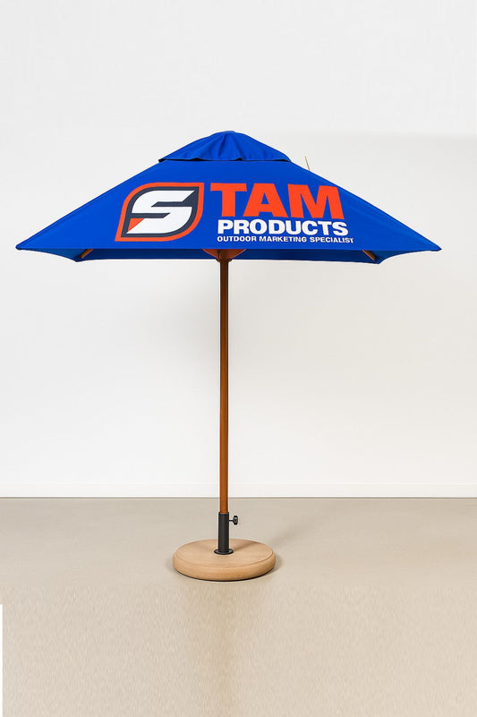Blue square branded umbrella with Stam Products logo and wooden frame on round base
