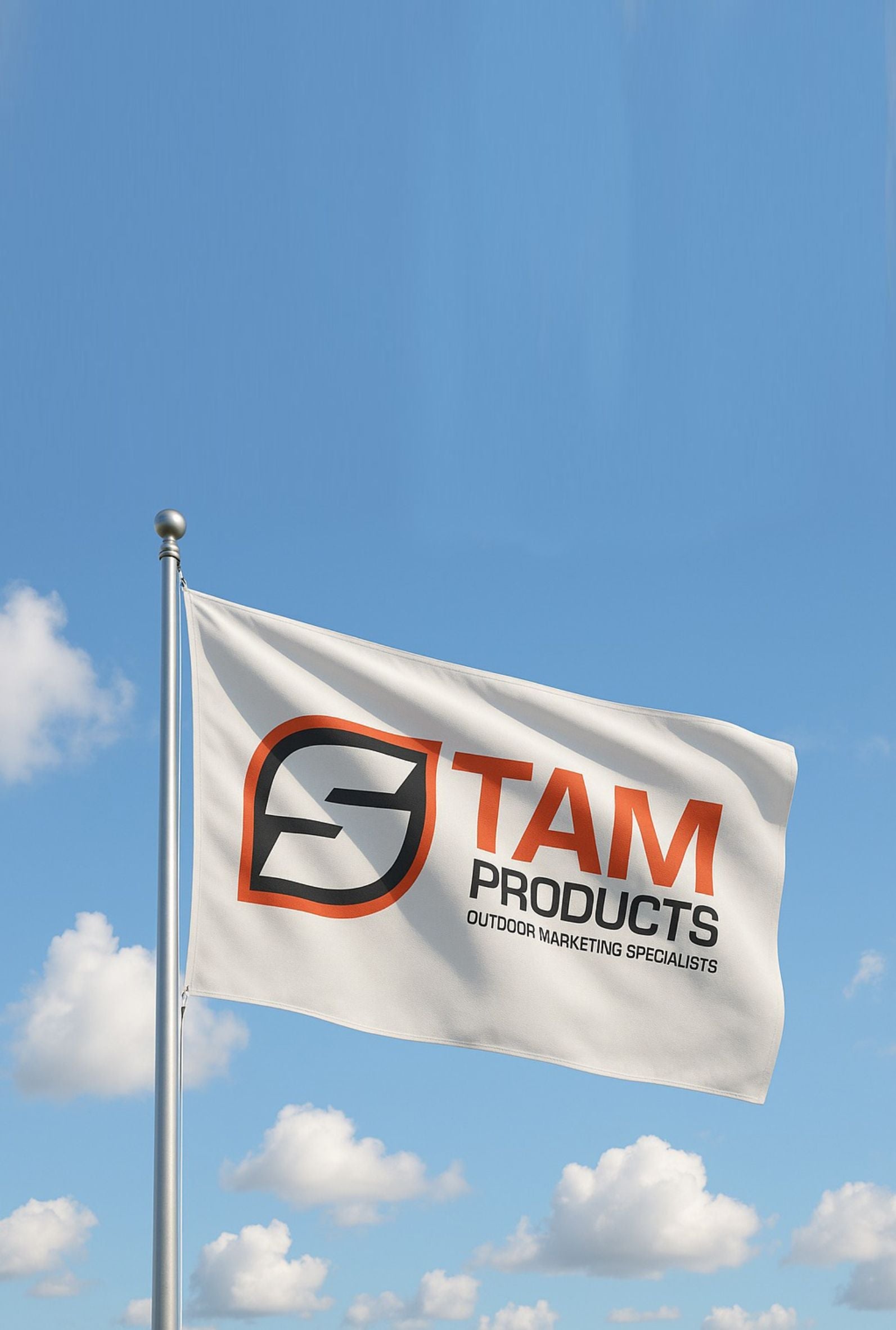 Stam Products high quality custom branded corporate flag waving on pole against blue sky
